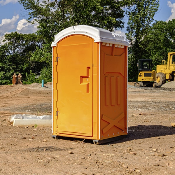 how often are the portable restrooms cleaned and serviced during a rental period in Adah